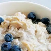 Oats With Granola And Blueberries And Cream · 