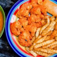 Jumbo Mango Jerk Shrimp - Itis With Crinkle Fries · Five jumbo tiger shrimp-itis are marinade to perfection in Jamaican jerk sauce. Jerk powder ...