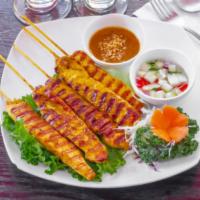  Satay Chicken · Sliced chicken marinated in Thai spices and grilled to perfection on bamboo skewers. Served ...