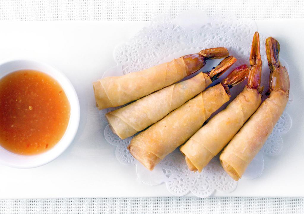 Bamboo Shrimp · Deep fried shrimp wrapped in rice paper. Served with sweet and sour sauce.