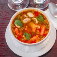 Tom Yum Soup · Spicy. Spicy and sour soup with lemongrass, galangal, kaffir lime leaf and mushroom.