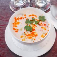 Tom Kha Soup · Spicy. Spicy and sour coconut soup with lemongrass, galangal, kaffir lime leaf and mushroom.