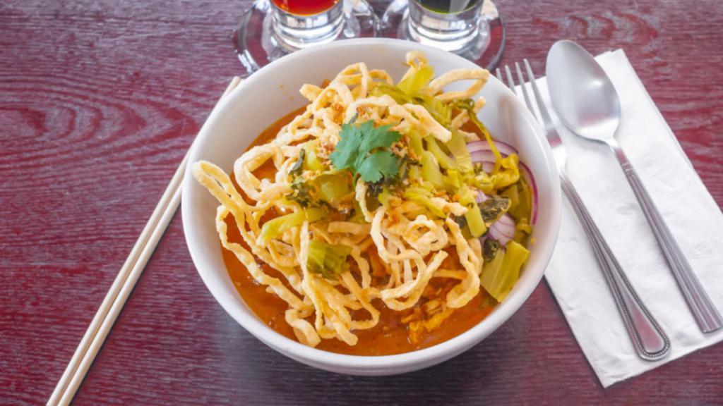 Khao Soi  · Try our *NEW* Northern Thai style Curry Noodle Soup. Contains : Noodles, Pickled greens, Bean sprouts, Fried shallot, Lime, topped with crispy noodles.