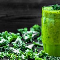 Healthy Green Smoothie · Fresh green apples, spinach, mango, bananas, and pineapples.