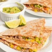 Jalapeño Bacon Steak Quesadilla · Crispy Bacon Quesadilla with grilled peppers, grilled onions, cheddar cheese, jack cheese, s...