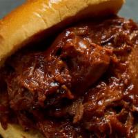 Bbq Chopped Brisket · Brisket burnt ends mixed with carrots & onions cooked in our house-made bbq sauce. Served ho...