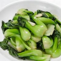 Sautéed Bok Choy 清炒上海苗 · With fresh garlic.