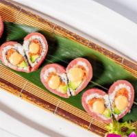 Sweet Heart Roll · Spicy tuna, avocado and tobiko wrapped with fresh tuna.