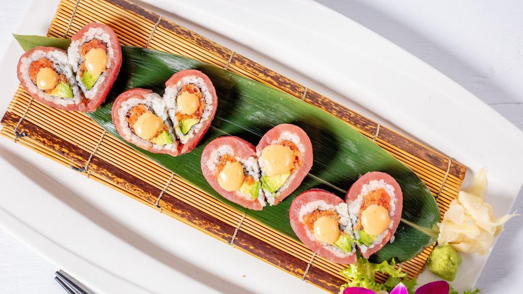 Sweet Heart Roll · Spicy tuna, avocado and tobiko wrapped with fresh tuna.