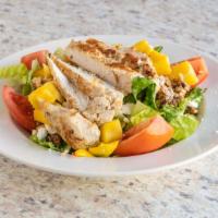 Mango Walnut Chopped Salad · Mixed greens, honey roasted walnuts, tomatoes, grilled chicken and goat cheese served with m...