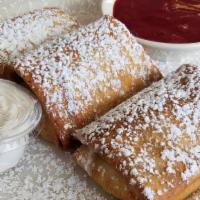 Cheese Blintzes · With raspberry sauce and sour cream.