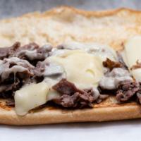 Roast Beef · Deluxe roast beef, Vermont Cheddar cheese, grilled onions and horseradish sauce.