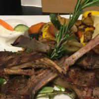 Lamb Chops · Marinated lamb chops served with Greek fires, mashed potatoes, rice, or house vegetables.