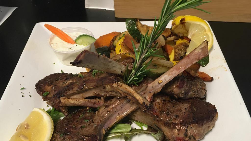 Lamb Chops · Marinated lamb chops served with Greek fires, mashed potatoes, rice, or house vegetables.