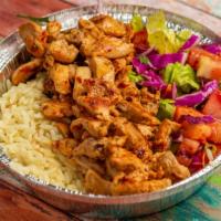 Chicken Platter · Marinated chicken thighs roasted in front of a charcoal fire. Rice and salad are served on t...