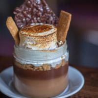 S'Mores In A Jar · choclocate pudding, grahm cracker crumble, toasted marshmallow, dark chocolate crunch bar