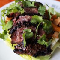 Asian Steak Salad · Toasted Sesame Dressing, Crispy Wontons