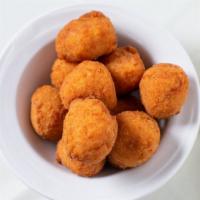 Arancini · Sicilian deep fried rice ball stuffed with meat and peas.(about the size of a golf ball) (on...