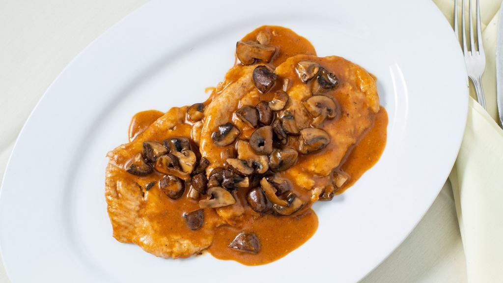 Chicken Marsala · Sautéed with marsala wine, mushrooms, and veal demi-glace.