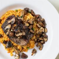 Braised Short Rib · Braised 48 hrs Served  with Arborio Risotto with tomato, Toasted Pinioli,  Currants, Cremini...