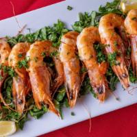 Gambas A La Plancha · Seared head on shrimp, rock sea salt, olive oil & lemon.