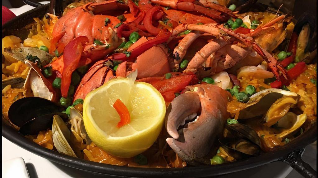 Paella Diablo (Per Person) · Very spicy, shrimp, clams, mussels, chicken, chorizo, sofrito, saffron rice.