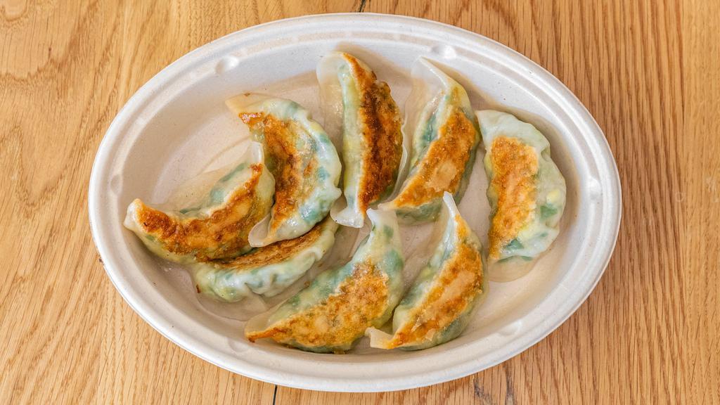Mighty Veggie 2.0 Dumplings · Zucchini, chives, bean thread noodles, carrots, and free-range egg. 6 pieces.