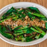 Taiwanese Street-Cart Greens · Taiwanese leafy greens with house made vegetarian garlicky sauce, topped with fried shallots...