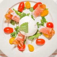 Burrata Cheese · Over speck, cherry tomatoes with a balsamic glaze.