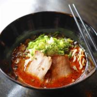 Sakurajima (Spicy).. · Spicy mixed broth made from pork and chicken, Pork Chashu, Scallions, Bean Sprouts and Fried...