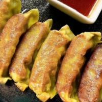Veggie Yaki Gyoza.. · Vegetable Pan fried Dumplings