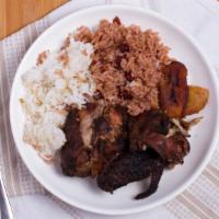 Jerk Chicken · Served with two sides and plantains.