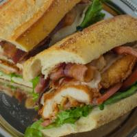 Chicken Fantastic On A Hero · Chicken cutlet, hot crispy bacon, melted mozzarella and lettuce on extra long seeded hero br...