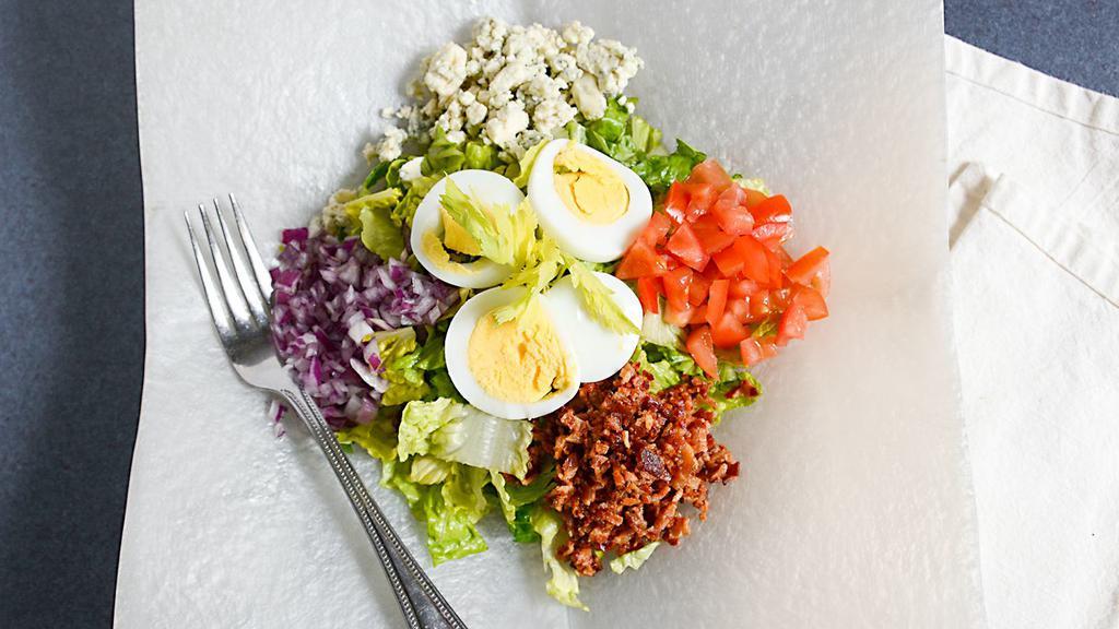 Cobb Salad · Iceberg lettuce, avocado, bacon, hard boiled egg, gorgonzola cheese, red onion, grilled chicken, cheddar with dressing of your choice.