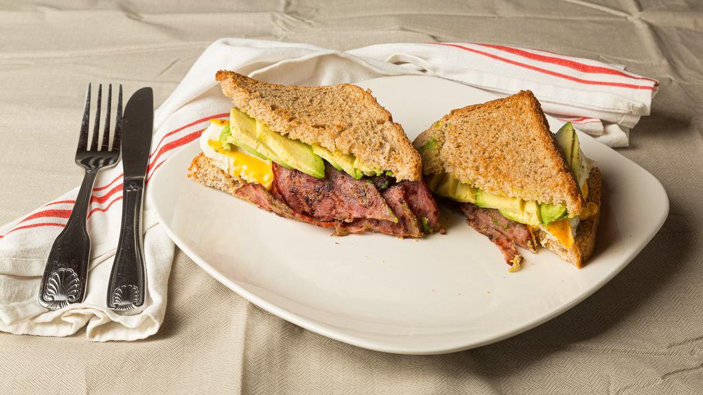 Beca · Turkey Bacon, Egg Whites, Low-fat American Cheese, and. Sliced Avocado on a Whole Wheat Roll.