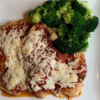 Chicken Parmigiana Entree · Baked breaded chicken cutlets topped with tomato sauce and low. fat mozzarella cheese. Serve...