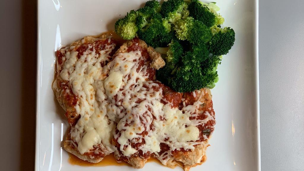 Chicken Parmigiana Entree · Baked breaded chicken cutlets topped with tomato sauce and low. fat mozzarella cheese. Served with a side of broccoli.