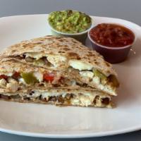 Original Quesadilla · Low-fat mozzarella cheese, carmelized onions, and peppers. smothered by two whole wheat tort...