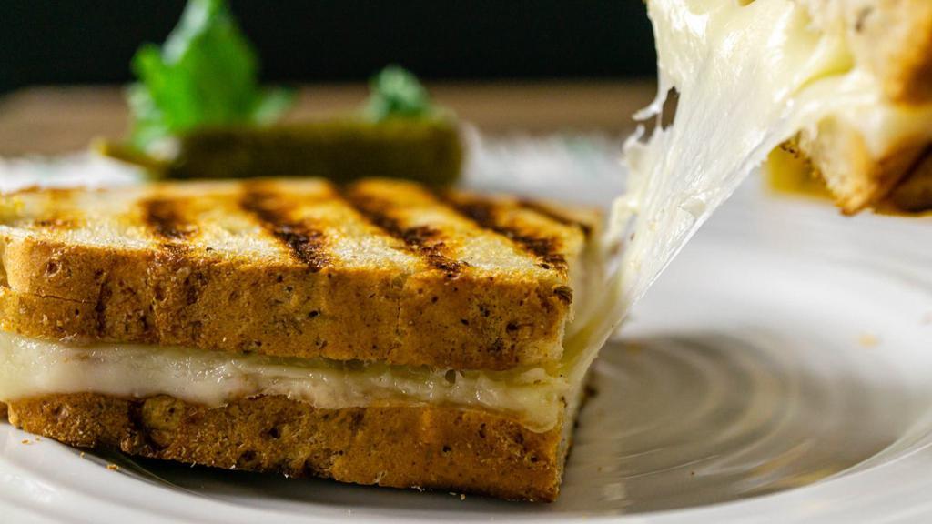 Swiss Grilled Cheese Sandwich · Delicious sandwich made with Swiss cheese, and customer's choice of bread. Topped with butter and grilled to perfection!