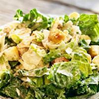 Caesar · Romaine lettuce, shaved parmesan cheese, croutons, Caesar dressing.