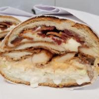 X Factor · Chicken cutlet, melted Mozzarella cheese, bacon, cole-slaw and Russian on a toasted garlic h...