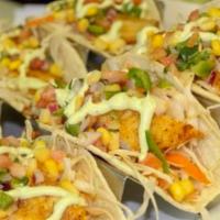 Fish Tacos (3) · Mahi mahi, pico de gallo, avocado ranch slaw, yellow rice, black beans, soft corn tortillas