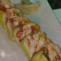 Riella · Shrimp tempura, cream cheese, avocado, mango, spicy crab, wrapped in soybean paper, topped w...