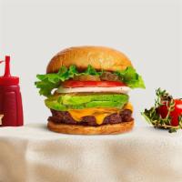 Avocado Vacancy Burger · Seasoned Beyond meat patty topped with avocado, melted vegan cheese, lettuce, tomato, onion,...