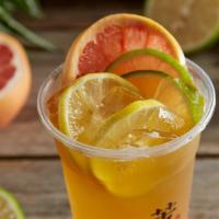 Grapefruit Green Tea. 鲜柠柚绿茶 · Yi Fang signature grapefruit tea with fresh grapefruit juice, lime and lemon slides,and pouc...
