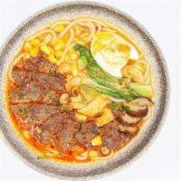 Mala Beef Jackpot · Mala broth, handpulled ramen, beef shank, baby bok choy, sweet corn, fish tofu, shiitake mus...