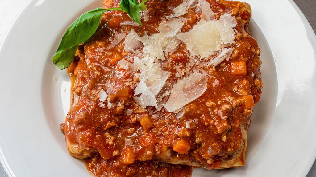 Monica'S Lasagna · Lasagna with bolognese sauce.