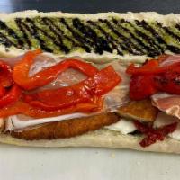 Milo · Chicken cutlet, prosciutto, mozzarella, sun dried tomato, roasted red pepper, olive oil and ...