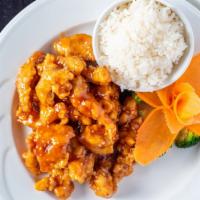 Sesame Chicken · Breaded chicken sautéed in a sweet brown sauce topped with roasted sesame seeds.