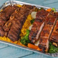 Pork Ribs Personal Portion · Quarter rack of BBQ pork ribs, choose 2 sides. Yellow rice, homemade fries, mixed veggies or...